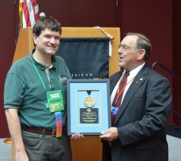 man receiving an award