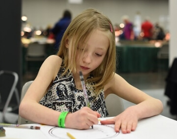 young girl drawing