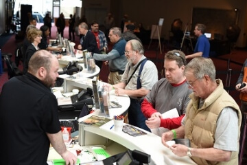 people in line at admission booths