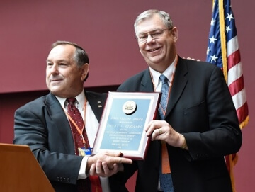 man receiving an award