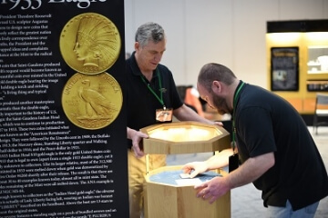 people looking at a.n.a. museum displays