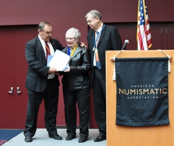 woman receiving an award