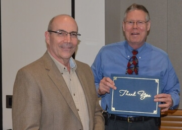 man receiving award