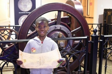 young boy at money museum