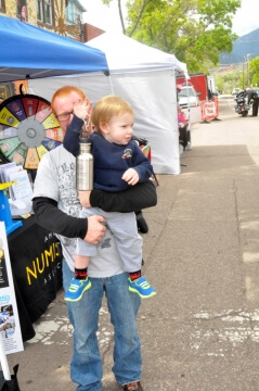 kids at outdoor a.n.a. table