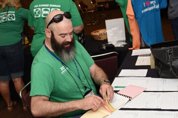 man sitting at table