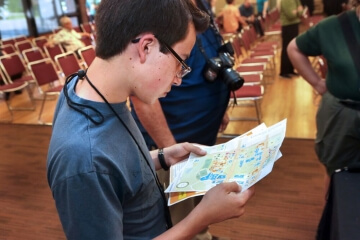 boy looking at papers