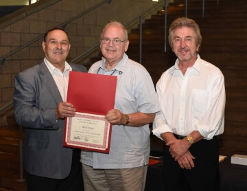 man receiving award