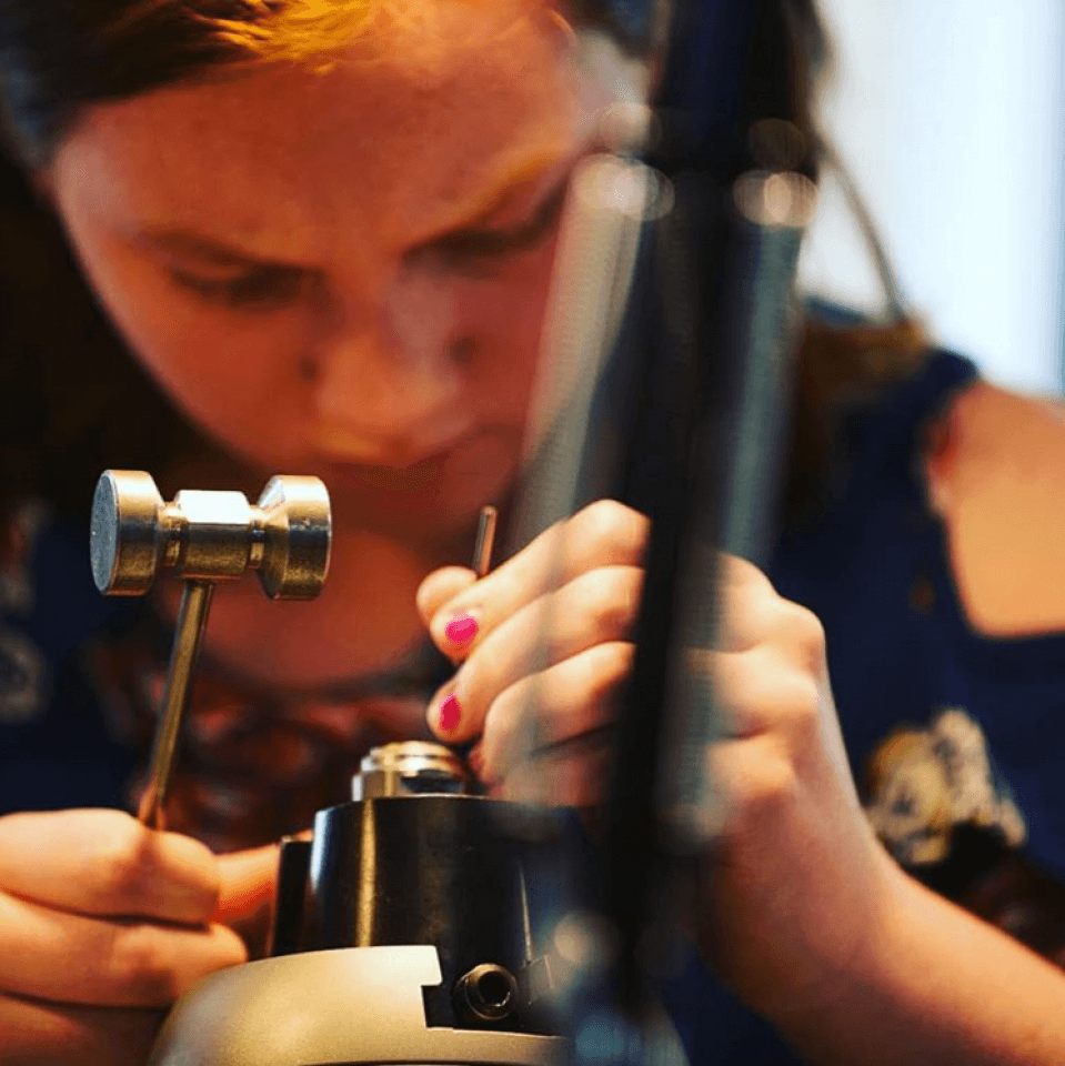 girl at summer seminar engraving class