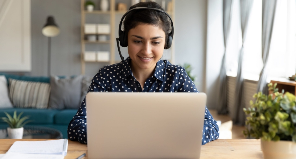 young woman elearning at laptop