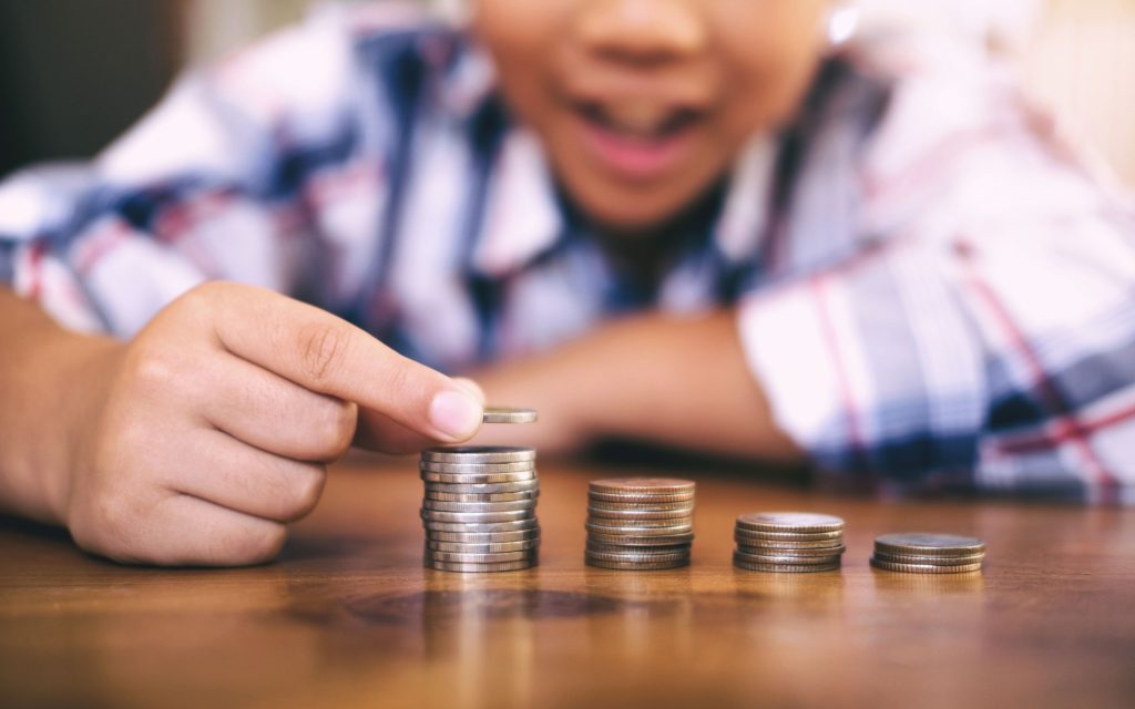 kid with coins