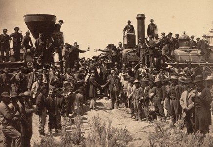 photograph of crowd around trains